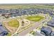 Aerial view of a community park with playground equipment and open green space at 4040 Eaton Park St, Aurora, CO 80019