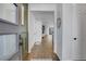 Inviting entryway with hardwood floors, and an open floor plan showcasing the home's interior at 4040 Eaton Park St, Aurora, CO 80019