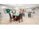 Basement featuring a gaming table, bar area, sports memorabilia, and neutral carpet at 3188 Lynwood Ave, Highlands Ranch, CO 80126