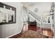 Elegant foyer with gleaming hardwood floors, a grand staircase, and an inviting open layout for a welcoming entrance at 3188 Lynwood Ave, Highlands Ranch, CO 80126