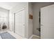 Hallway features convenient storage solutions, with closets and coat hooks at 3188 Lynwood Ave, Highlands Ranch, CO 80126
