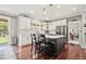 Charming kitchen with an island, modern appliances, and a view to the outdoors at 3188 Lynwood Ave, Highlands Ranch, CO 80126