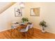 Dining room with hardwood floors, a light and airy feel, and ample natural light at 6424 Silver Mesa Dr # C, Highlands Ranch, CO 80130