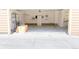 Attached garage with shelving and ample storage at 6424 Silver Mesa Dr # C, Highlands Ranch, CO 80130