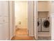 Convenient laundry room with washer and dryer, plus extra storage at 6424 Silver Mesa Dr # C, Highlands Ranch, CO 80130