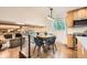 Cozy breakfast nook overlooking living room with natural light and view of fireplace at 1977 S Urban St, Lakewood, CO 80228