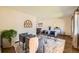 Stylish living room featuring modern furniture, plush rug, and ample natural light at 1977 S Urban St, Lakewood, CO 80228