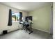 Bedroom featuring a dedicated workspace with dual monitors at 11376 Forest Dr, Thornton, CO 80233