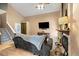 Stylish living room showcases hardwood floors, a modern media center, a fireplace, and comfortable seating at 11376 Forest Dr, Thornton, CO 80233