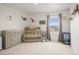 Cozy Bedroom with crib, dresser, and natural light, perfect for a room at 562 Twilight Ct, Fort Lupton, CO 80621