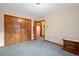 Bedroom with closet, neutral walls, and carpeted floors, offering a blank canvas for personalization at 34480 Pine Ridge Cir, Elizabeth, CO 80107