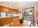 Bright dining area with views to the deck and open to the kitchen, perfect for gatherings at 34480 Pine Ridge Cir, Elizabeth, CO 80107