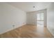 Bright bedroom with hardwood flooring and natural light at 700 N Washington St, Denver, CO 80203