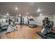 Well-equipped gym with mirrored wall and a variety of exercise machines at 700 N Washington St, Denver, CO 80203