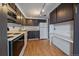 Efficient kitchen features new appliances and sleek cabinets, perfect for preparing delicious meals with ease at 700 N Washington St, Denver, CO 80203