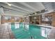 Indoor swimming pool with lots of natural light, brick walls and ceiling pipes at 700 N Washington St, Denver, CO 80203
