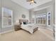 Serene main bedroom with vaulted ceiling, plantation shutters, and plush carpeting at 8312 S Peninsula Dr, Littleton, CO 80120