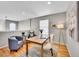 Cozy office space with hardwood floors, featuring comfortable seating, natural light, and stylish decor at 8312 S Peninsula Dr, Littleton, CO 80120
