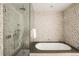 Spa-like bathroom with a large walk-in shower and soaking tub at 1133 14Th St # 2720, Denver, CO 80202