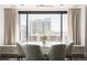 Modern dining room with marble table and city views at 1133 14Th St # 2720, Denver, CO 80202