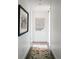 Bright hallway with wood flooring and modern artwork at 1133 14Th St # 2720, Denver, CO 80202