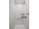 Shower with white subway tile and a glass enclosure at 603 Inca St # 330, Denver, CO 80204