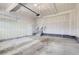 Spacious garage offers ample parking and storage, with potential for customization and organization at 6172 N Liverpool St, Aurora, CO 80019