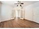 Bedroom with beautiful wood floors and double doors at 7922 S Algonquian Way, Aurora, CO 80016