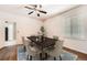 Dining room with decorative lighting and hardwood floors at 7922 S Algonquian Way, Aurora, CO 80016