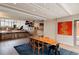 Bright dining room with open floor plan, hardwood floors, and modern lighting at 101 S Humboldt St, Denver, CO 80209