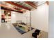 A bright exercise room with pilates machine and minimalist design offers a dedicated workout space at 101 S Humboldt St, Denver, CO 80209