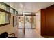 Contemporary foyer with hardwood floors, recessed lighting, and stylish modern front door at 101 S Humboldt St, Denver, CO 80209