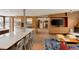 Open concept kitchen with an extra long island and stainless steel appliances at 101 S Humboldt St, Denver, CO 80209