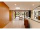 Open living area with sleek design, hardwood floors, and access to the outdoor patio at 101 S Humboldt St, Denver, CO 80209