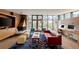 Bright living room with floor-to-ceiling windows, modern fireplace and designer furniture at 101 S Humboldt St, Denver, CO 80209