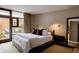 Tranquil main bedroom with a private patio and soothing neutral tones at 101 S Humboldt St, Denver, CO 80209