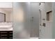 Modern bathroom with a frameless walk-in shower and contemporary shower system at 101 S Humboldt St, Denver, CO 80209