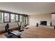 Spacious workout room with exercise equipment, wood floors, and natural light at 101 S Humboldt St, Denver, CO 80209