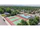 Great view of the community pool, tennis courts, and lush greenery surrounding the neighborhood at 11542 W 29Th Pl, Lakewood, CO 80215