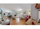 Inviting living room flowing seamlessly into the kitchen and dining area at 11542 W 29Th Pl, Lakewood, CO 80215