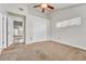 Spacious carpeted bedroom with vaulted ceiling, closet, and well-lit interior at 3261 S Waco Ct # C, Aurora, CO 80013