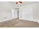 Bright bedroom with vaulted ceilings, carpet, and closet providing ample storage at 3261 S Waco Ct # C, Aurora, CO 80013