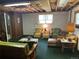 Relaxing living room with comfortable seating and a cowboy theme at 4393 Pima Rd, Indian Hills, CO 80454