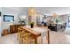 Stylish dining area features a dining table with seating and a decorative light fixture at 4930 Gray St, Denver, CO 80212