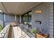 Charming front porch with stylish seating, decorative plants, and a welcoming ambiance at 4930 Gray St, Denver, CO 80212