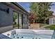 Close-up view of a luxurious hot tub on the patio, offering a relaxing outdoor spa experience in a private backyard at 4930 Gray St, Denver, CO 80212