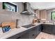 Modern kitchen with sleek countertops, stainless steel appliances, and contemporary design at 4930 Gray St, Denver, CO 80212
