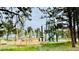 Fun playground with various climbing structures and play areas, perfect for outdoor recreation and activities at 4930 Gray St, Denver, CO 80212