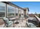 Inviting back deck with comfortable seating, perfect for outdoor gatherings and enjoying scenic views at 7262 Serena Dr, Castle Pines, CO 80108