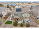 This home features a large deck, a patio, solar panels, and landscaped surroundings at 7262 Serena Dr, Castle Pines, CO 80108